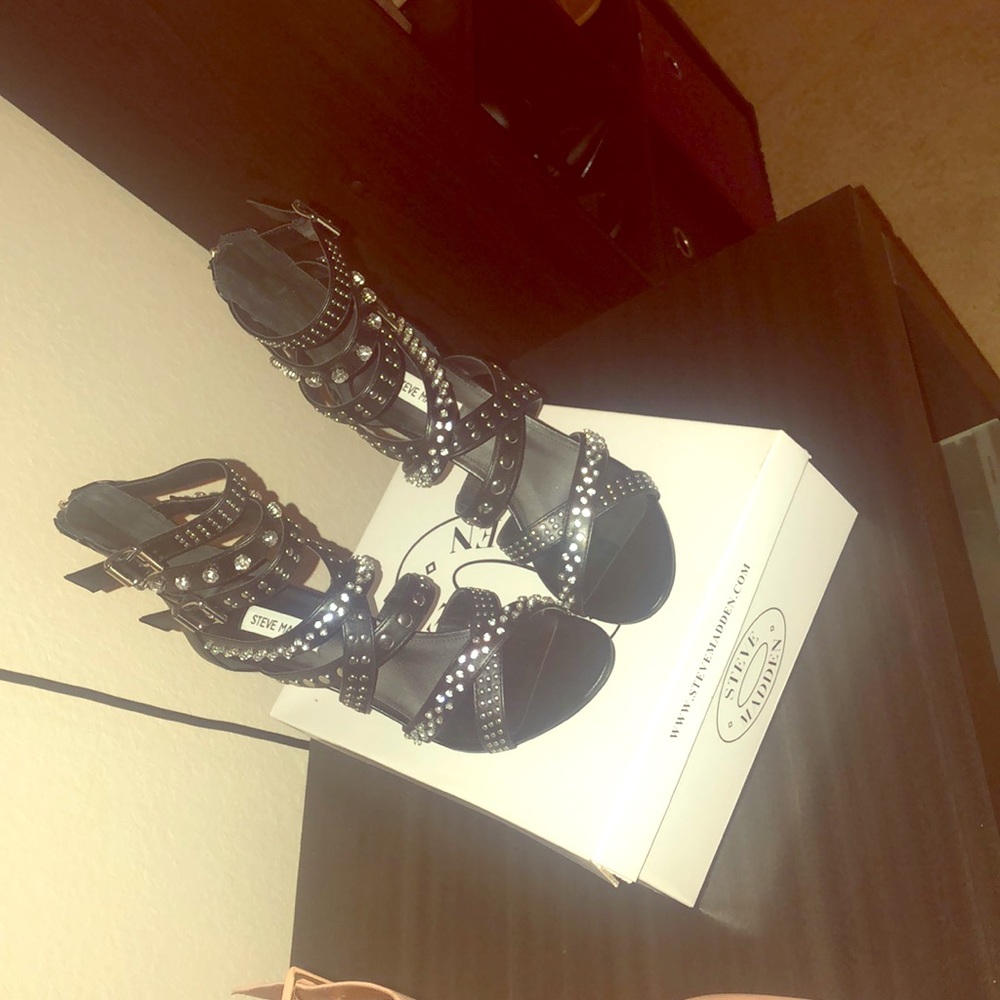 Black Steve Madden Heels, with silver stones.